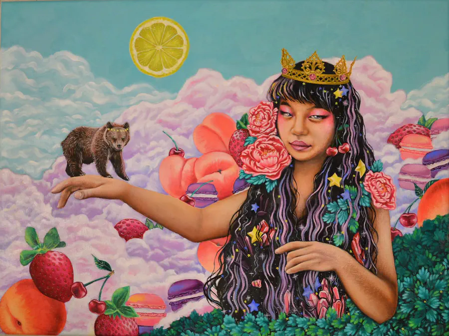 A woman wearing a crown who has black hair with purple, pink, blue, and yellow streaks as well as flowers, cherries, and stars growing from her hair. She has an outrestched arm, and a bear is walking on her hand. The 'sun' is actually a lemon slice, and there is a backdrop of fluffy pink and purple clouds with macarons and fruits tucked in them.