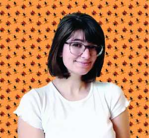 An image of a person with glasses standing in front of a background of stylized cartoon bugs.